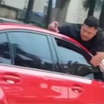 pria_gelantungan_di_mobil-pldg_large